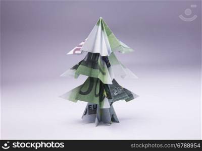 Money Origami Christmas tree. Christmas tree origami made of banknotes euro. Handmade