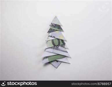 Money Origami Christmas tree. Christmas tree origami made of banknotes euro. Handmade