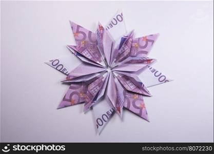 Money Origami snowflake. snowflake origami made of banknotes euro. Handmade
