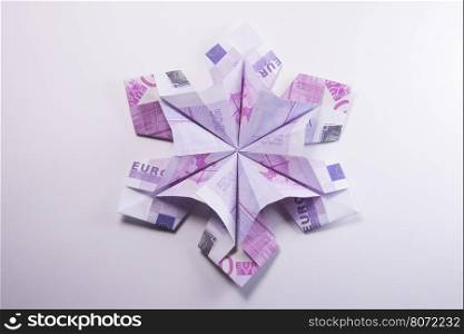 Money Origami snowflake. snowflake origami made of banknotes euro. Handmade
