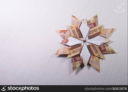 Money Origami snowflake. snowflake origami made of banknotes rubles. Handmade