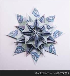 Money Origami snowflake. snowflake origami made of banknotes rubles. Handmade