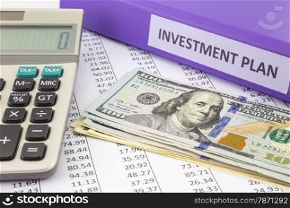 Money place on financial report with purple binder of investment plan, concept for saving fund and return on investment