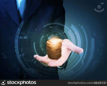 Money saving. Close up of businessman holding stack of coins in palm