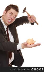 money saving concept. Nerdy funny business man guy with hammer about to smash piggy bank isolated on white