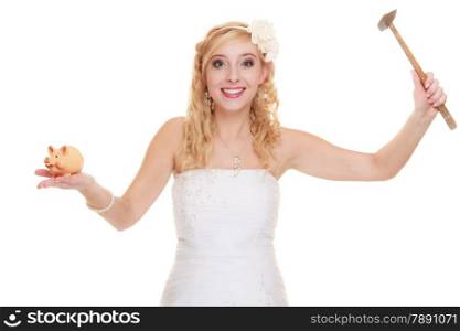 Money saving, marriage and high wedding cost concept. Funny woman bride with hammer about to smash piggy bank isolated on white