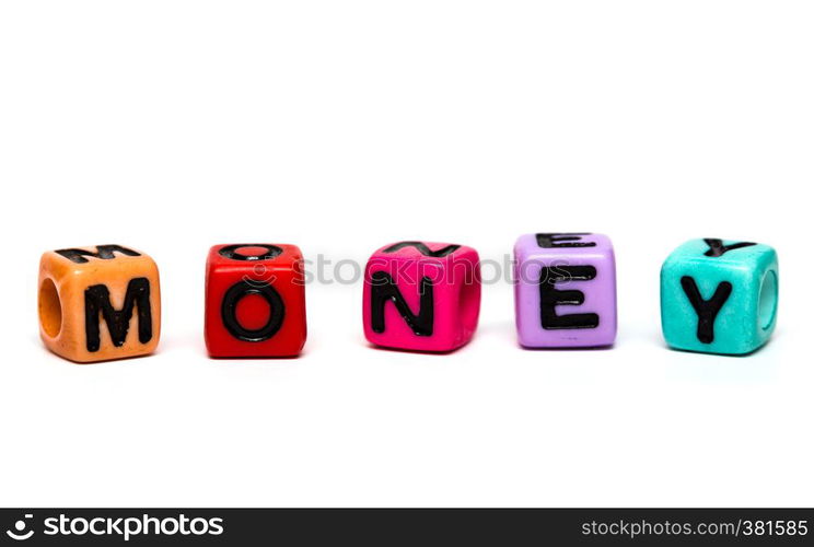 money - word made from multicolored child toy cubes with letters