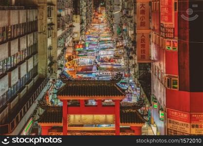 MONG KOK, HONG KONG - JULY, 2019 : Top view scene of Public Temple street on July 4, 2019 at Yau Ma Tei station area, Hong Kong, Temple Street is the most famous night market in Hong Kong.