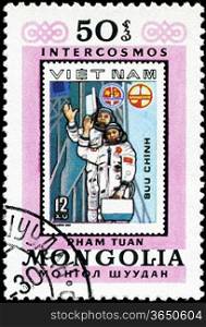 MONGOLIA - CIRCA 1981: A stamp printed by Mongolia, shows Vietnam Cosmonauts, circa 1981