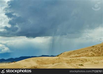 Mongolia. Sands Mongol Els dunes . Stormy dramatic sky