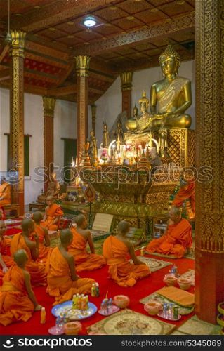Monks in Wat Nong Sikhounmuang temple, Luang Prabang, Laos