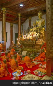 Monks in Wat Nong Sikhounmuang temple, Luang Prabang, Laos