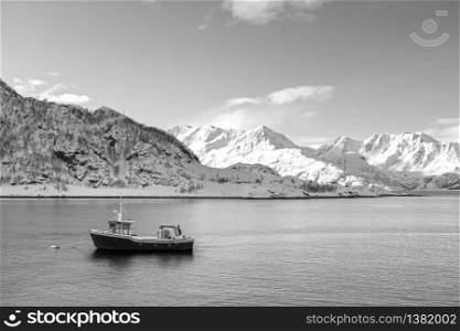 Monochromatic or black and white coastal Landscape outside the village of Oksfjord in Loppa municipality in Finnmark county, Norway. Monochromatic or black and white coastal Landscape outside the village of Oksfjord in Loppa municipality in Finnmark county, Norway.