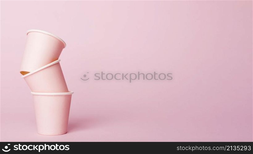 monochromatic still life composition with paper cups
