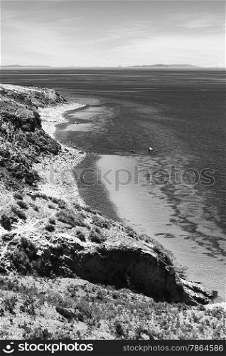 Monochrome image of the shoreline on the northern tip of the popular travel destination Isla del Sol (Island of the Sun) in Lake Titicaca close to Copacabana in Bolivia