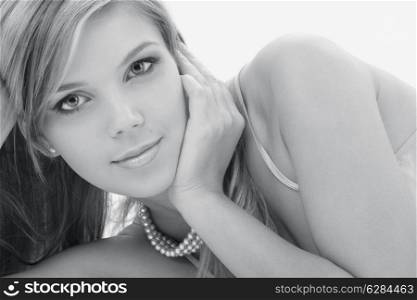 monochrome portrait of mysterious blonde in pearls
