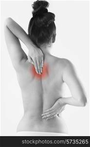Monochrome Studio Shot Of Woman With Painful Back