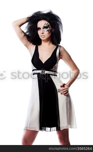 Monochrome style woman in dress with face art and magnificent hair on white background