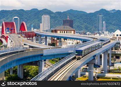 monorail track and highway red bridge to Kobe downtown Hyogo Kansai Japan