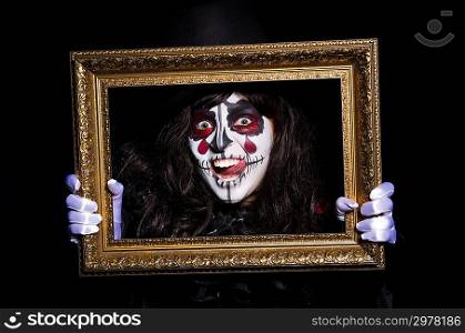 Monster with picture photo frame in dark room0