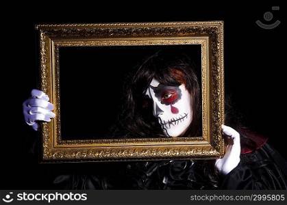 Monster with picture photo frame in dark room0