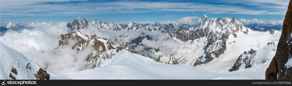 Mont Blanc rocky mountain massif summer view from Aiguille du Midi Mount, Chamonix, French Alps.