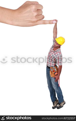 Montage of a tiny man hanging to a finger