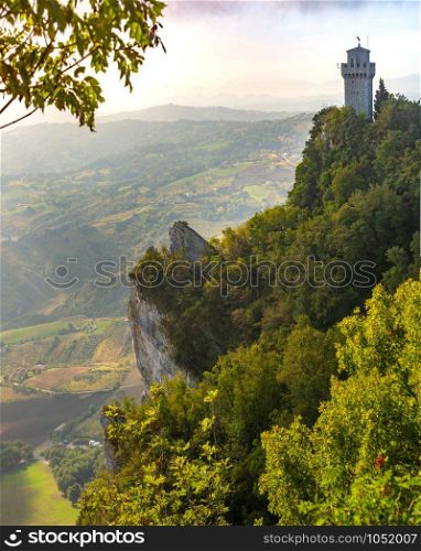 Montale, Third tower, smallest of the three peaks of Monte Titano in the city of San Marino of the Republic of San Marino in sunny day. Montale tower in San Marino