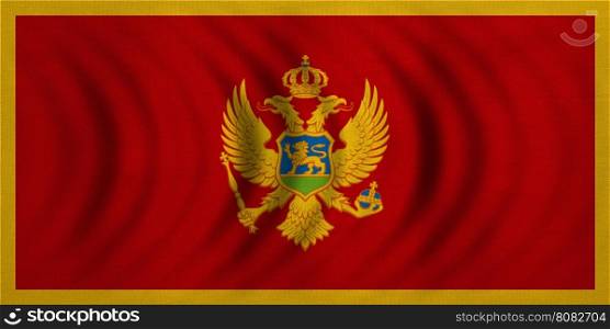 Montenegrin national official flag. Patriotic symbol, banner, element, background. Correct colors. Flag of Montenegro wavy with real detailed fabric texture, accurate size, illustration