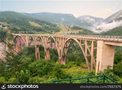 Montenegro. Dzhurdzhevich Bridge Over The River Tara. Bridge Over River Tara