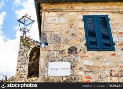 Monteriggioni, Tuscany, Italy. Street plate of the main square of the town.