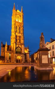 Monument to Jan Frans Willems and Saint Bavo Cathedral in the evening. Sint-Baafsplein, Flanders, Ghent, Belgium