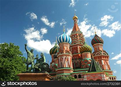 Monument to Minin and Pozharsky and Saint Basil&acute;s Cathedral on Red Square, Moscow Russia