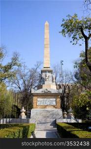 Monument to the Fallen for Spain (Spanish: Monumento a los Caidos por Espana) from 1840 at the Plaza de la Lealtad in Madrid, Spain.