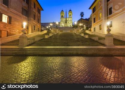 Monumental stairway Spanish Steps, seen from Piazza di Spagna, and Trinita dei Monti church during morning blue hour, Rome, Italy.. Spanish Steps at night, Rome, Italy.