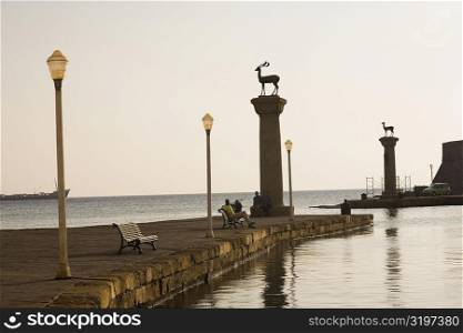 Monuments in the sea, Mandraki Harbor, Rhodes, Dodecanese Islands, Greece
