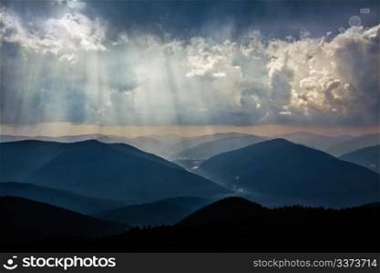 Moody evening sky upon beautiful Carpathians mountains