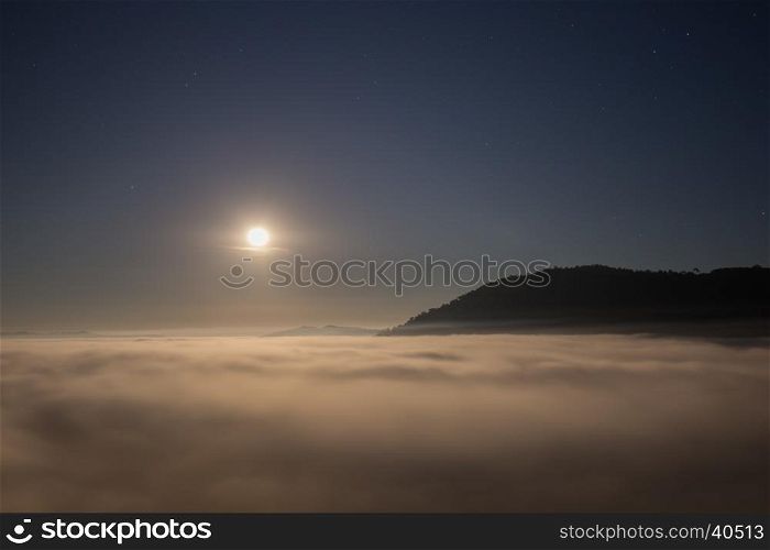 moon and fog in the morning with mountain at Khao Kho, Phetchabun, Thailand