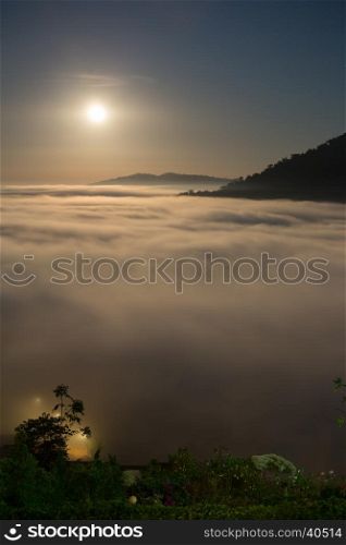 moon and fog in the morning with mountain at Khao Kho, Phetchabun, Thailand