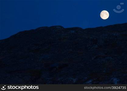Moon and rocks. Moon at night with rocky surface in the forground