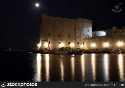 Moon and wall of fortress in Dubrovnic, Croatia