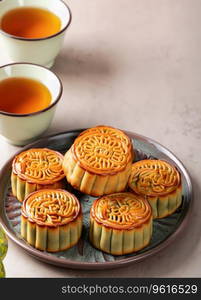 Moon cakes at mid autumn festival. Background food and drink tea and Mooncakes, copy space