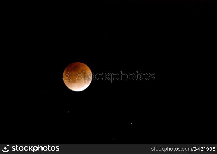Moon during lunar eclipse. Red moon during a lunar eclipse on a black sky