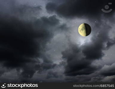 Moon glowing in the dark night sky. Moon glowing in the dark night sky with stars. Cosmic landscape. Moon in starlit night