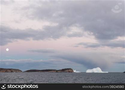 Moon icebergs and dramatic sky ocean landscape. Moon icebergs and dramatic sky ocean landscape in Greenland