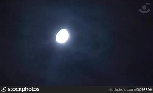 moon is moving in the night sky