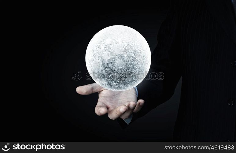 Moon planet. Close of man hands holding moon planet