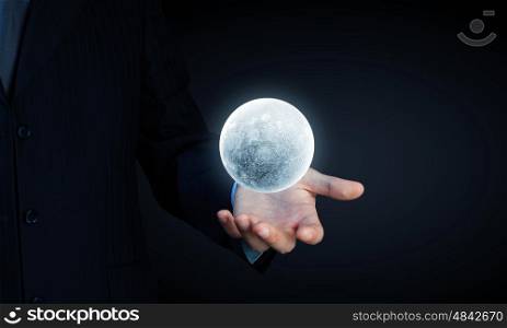 Moon planet. Close of man hands holding moon planet