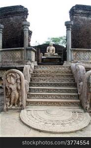Moon stone and seated Buddha in vatadage in Polonnaruwa, Sri Lanka