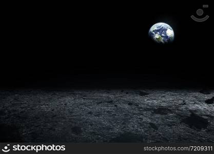 Moon surface and Earth on the horizon. Space art fantasy. Black and white. Elements of this image furnished by NASA